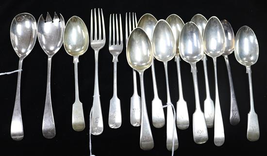 A pair of silver salad servers and a quantity of fiddle and Old English pattern silver flatware, George III and later